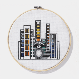 Diana Watters - CROSS STITCH - Raccoon in the City (7in)